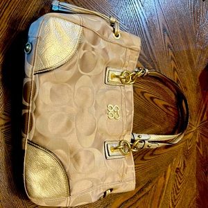 Coach purse used but in great shape! Cream and gold
